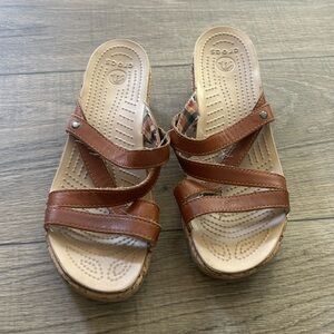Crocs wedge heel sandals.